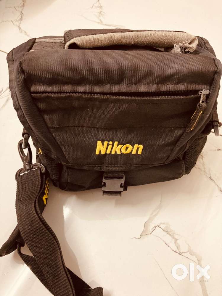 Nikon DSLR with two Lenses and Flash
