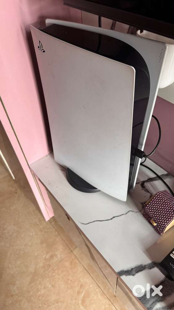 PS5 disc edition 1 TB with 2 new controllers and some gaming CDs