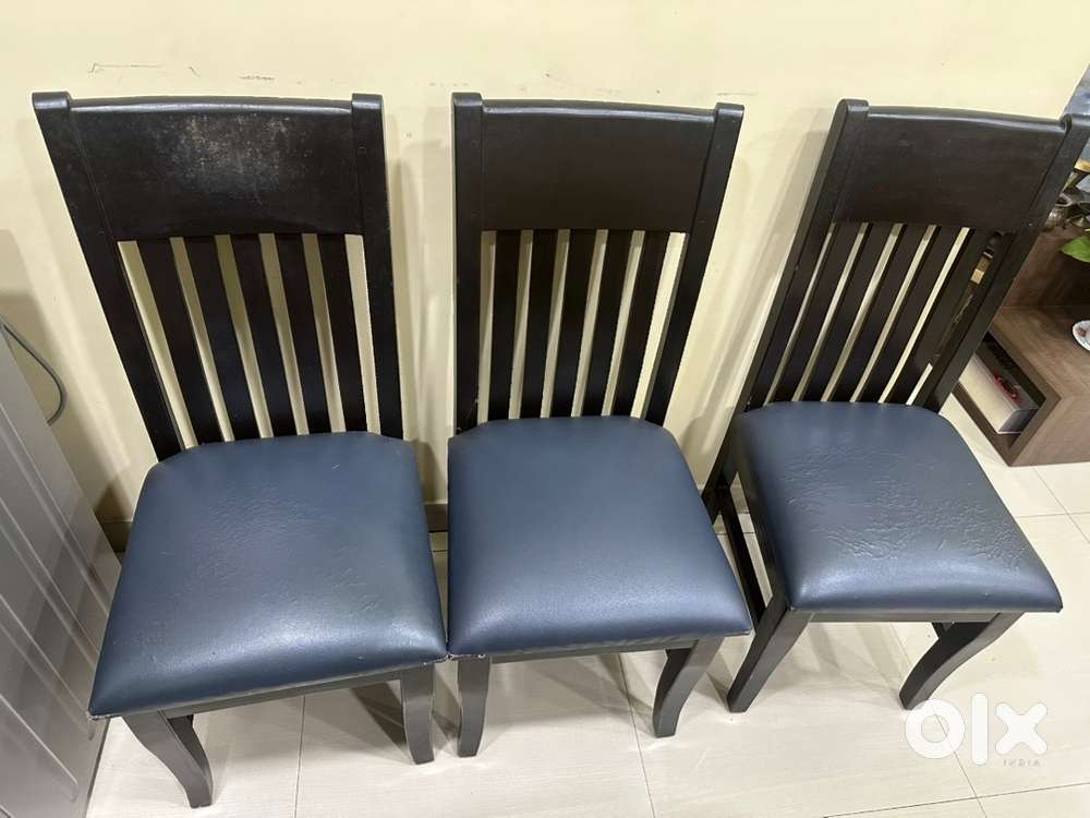 Three wooden chairs