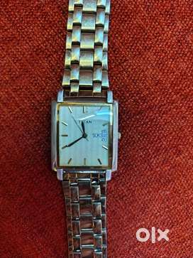 Titan Hand Watch with date and Day