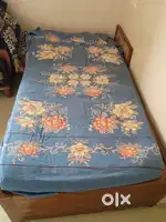 Single bed with luggage keeping space