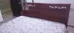 Cot with spring mattress