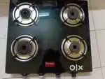 Four burner glass top gas stove