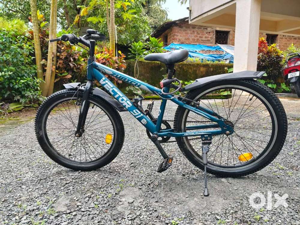 2 bicycles - 1 Hero + 1 Vector 91, and 2 Helmets for sale