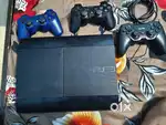 Ps3 super slim with 3 controller and 29 games