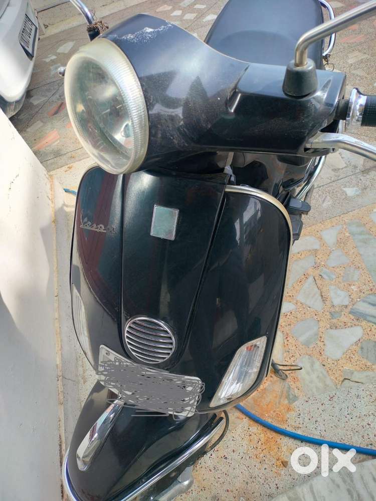 Black Vespa- single hand driven