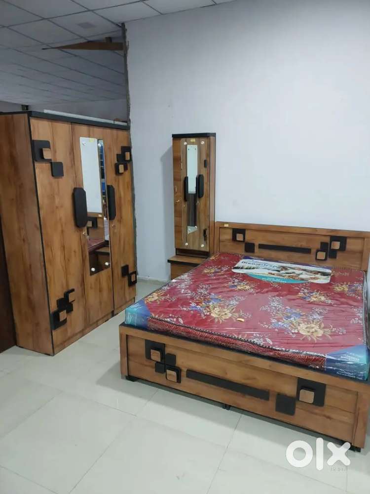 Bed and cupboard