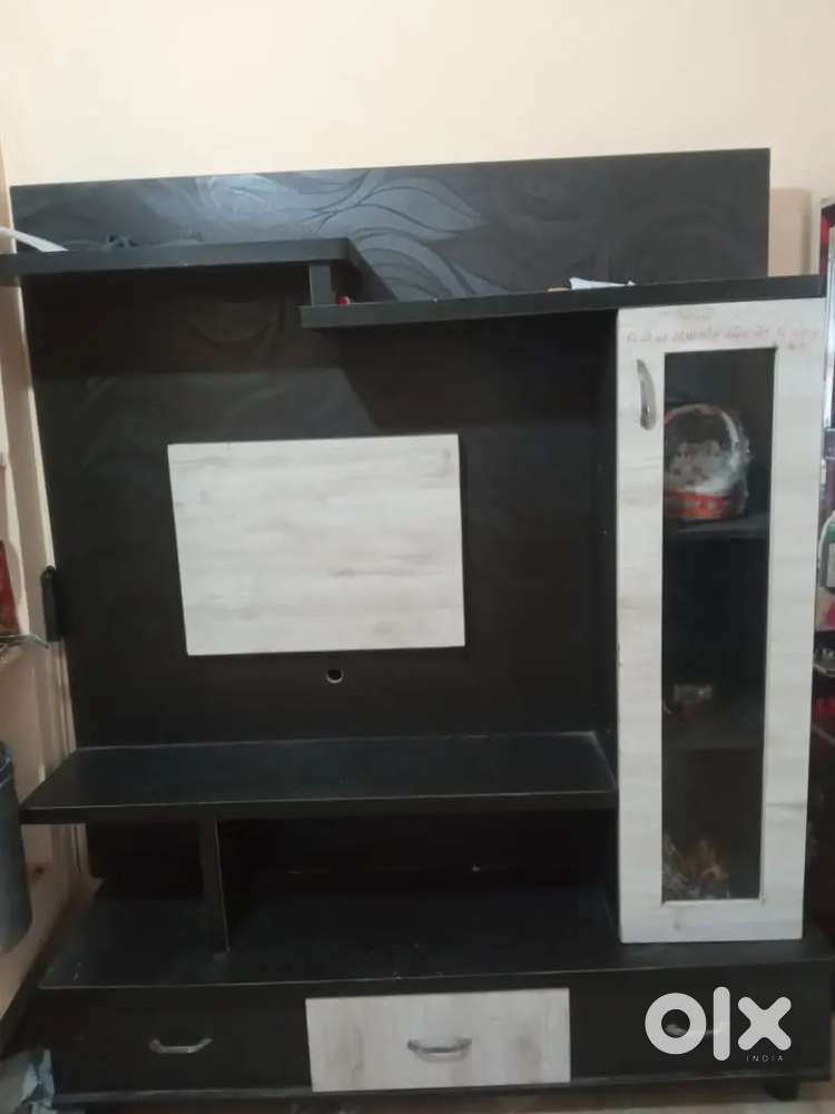 T.v showcase with boxes