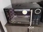 KENSTAR MICROWAVE 23 LTR MODEL # KK23CBG100