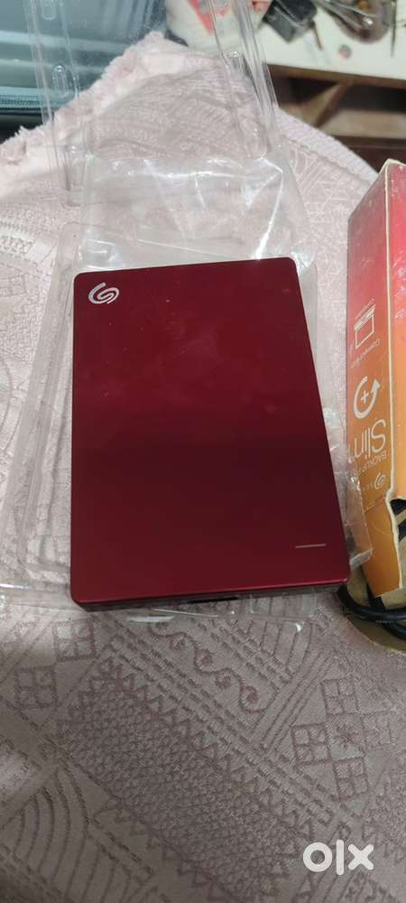 Seagate Plus Slim 1 TB External Hard Disk Drive (HDD) (Red)