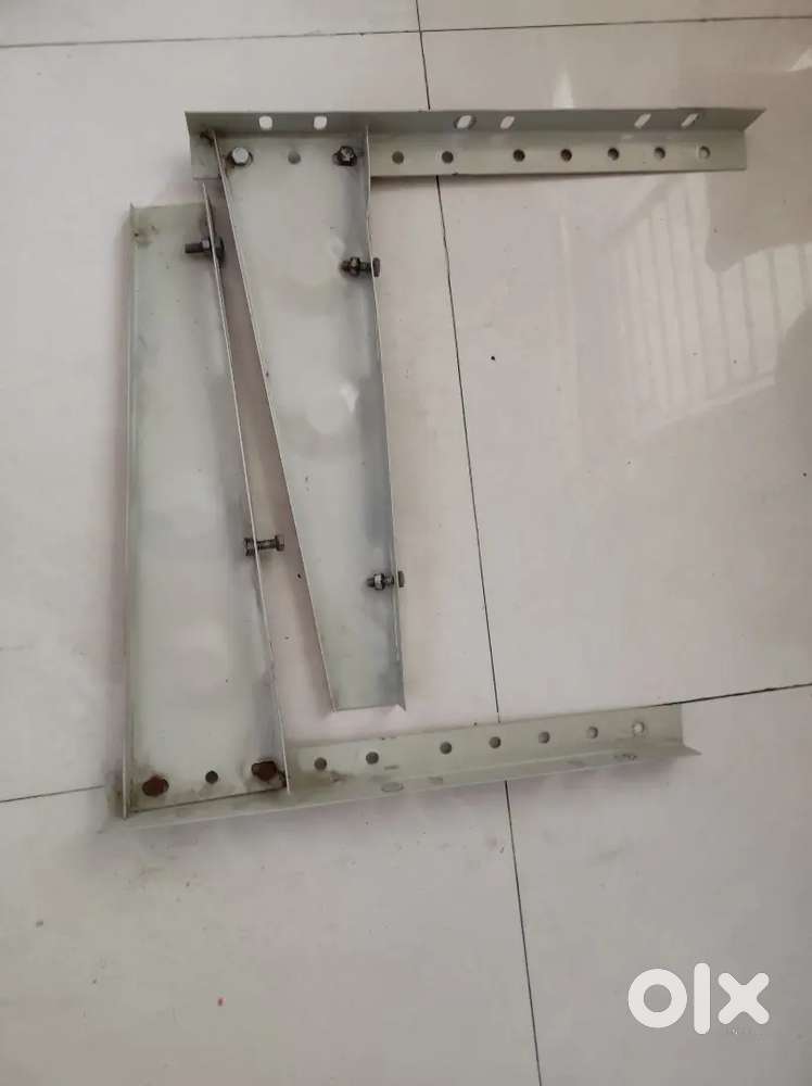 Ac outdoor unit mounting brackets