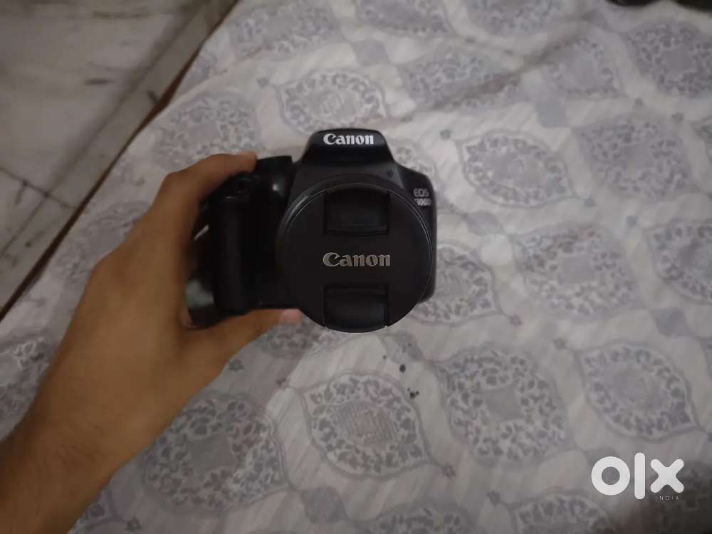 Canon 1300 D with 18-55 mm lens.