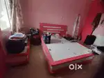 King size bed with side sofa and study table