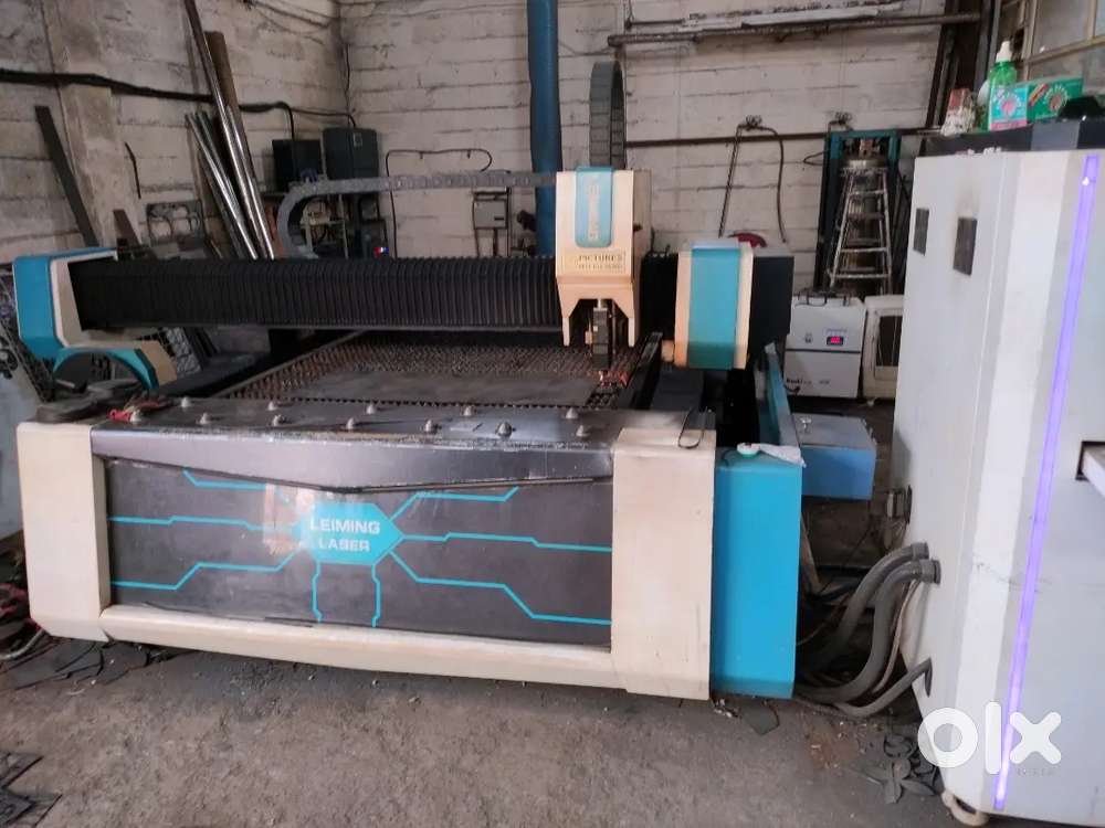 1.5 KW FIBER LASER CUTTING MACHINE WITH PIPE CUTTING ATTACHMENT