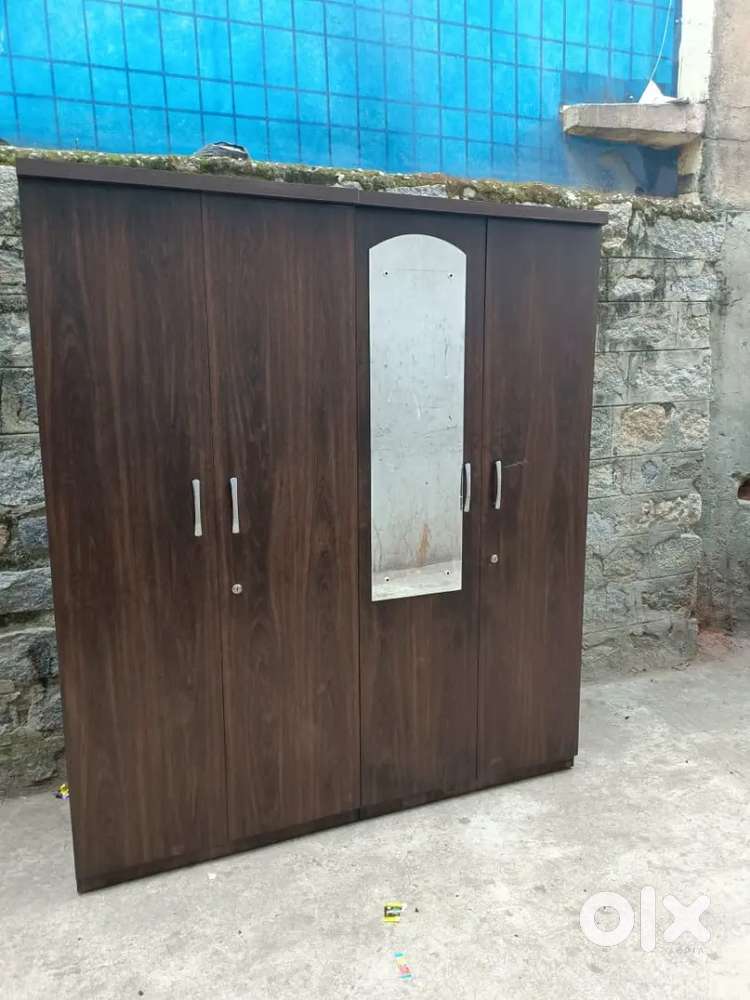 brand new four door wardrobe with mirror - free delivery