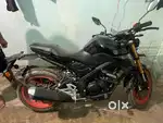 Bike in new condition deluxe model blk red with accessories