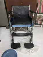 Wheel chair with commode
