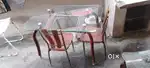 Glass dining table with 4 chairs