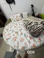 Round wooden Doublebed with boxes