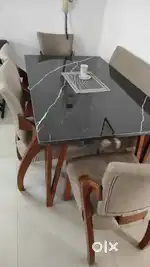 Marble finished dining table with 6 sitting chair