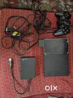 Playstation 2 jailbroke with 100 games and 320gb harddisk controller