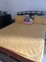 Queen wooden bed with side table and small almirah