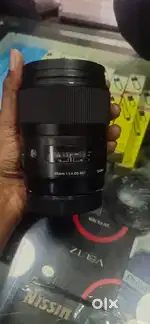 Sigma 35 mm canon mount 1.4 bill box 1 year old