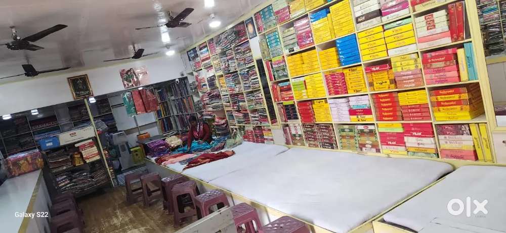 Salesman and helper for cloth shop