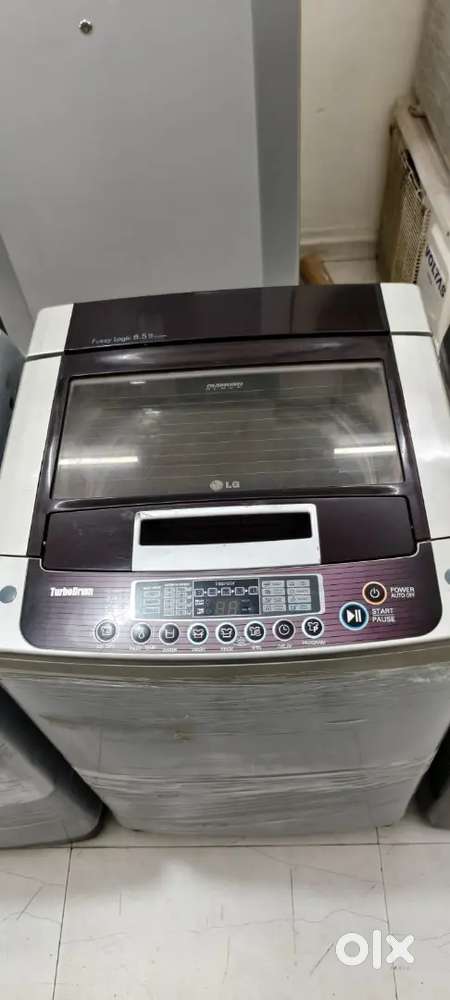 LG washing machine fully automatic top load with warranty 1 year old