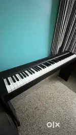 Yamaha P-145 88 weighted key piano with L100 stand