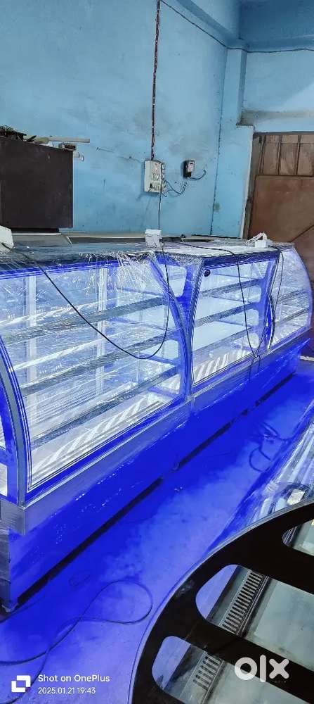 Sweet shop cake pastry display counter showcase 9 month old