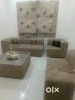 L shape sofa set along with center table
