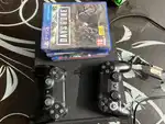 PS4 with additional controller and games