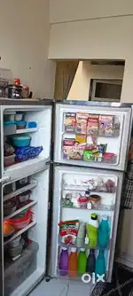 Whirlpool fridge hai double door bohot acchi condition me hai