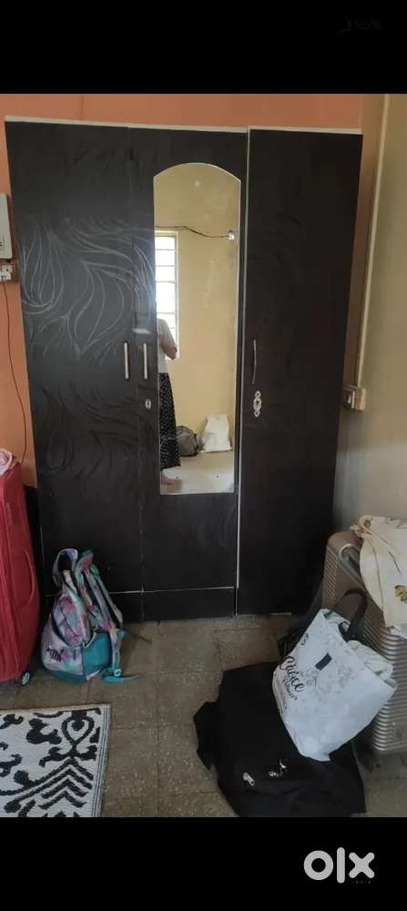 Triple door cupboard with lock and keys