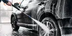 Male carwash staff at  shopping Complex parking area