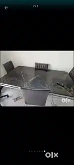 Six seater glass Dining table with three chairs