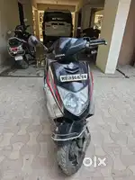 Black and Red Honda Dio