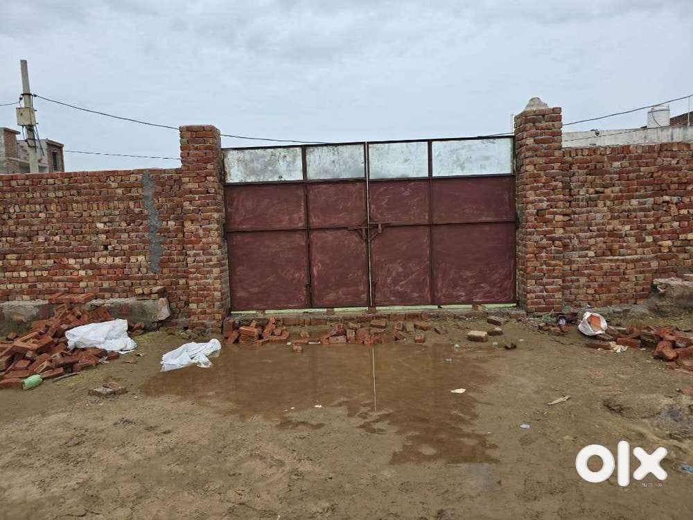 1400 gaj land with boundary wall