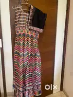 Black brand new gown with net dupatta and sleeves inside.