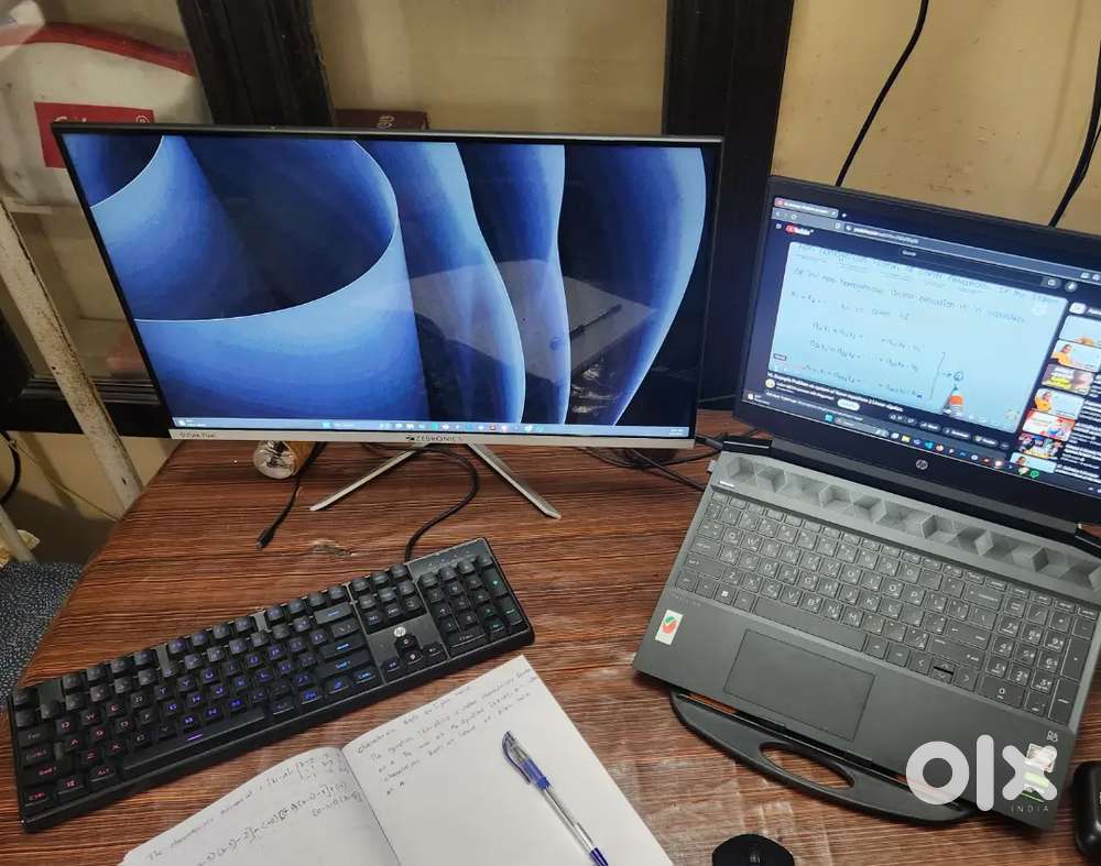 HP Pavillion Gaming Laptop with monitor, keyboard and mouse