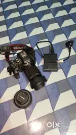 Canon R10 with 50mm and 18/150mm or without 50mm Two battery