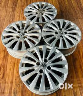 15 inch Suzuki silver alloys for swift Ritz ciaz Baleno Dzire Set of 4
