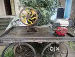 Sugarcane juicer machine with engine
