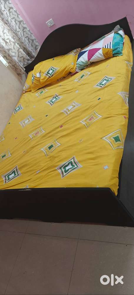 Wooden cot with coir mattress