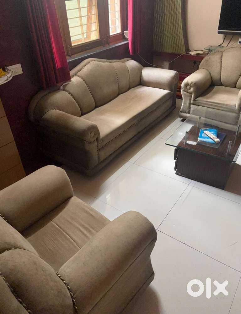 5 seater sofa with glass table