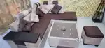 L shape sofa set with square center table and two puffy