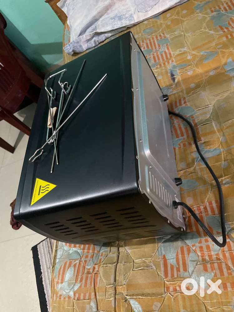 18 litre with crumb tray oven toaster grill (OTG) by MARQ FLIPKART