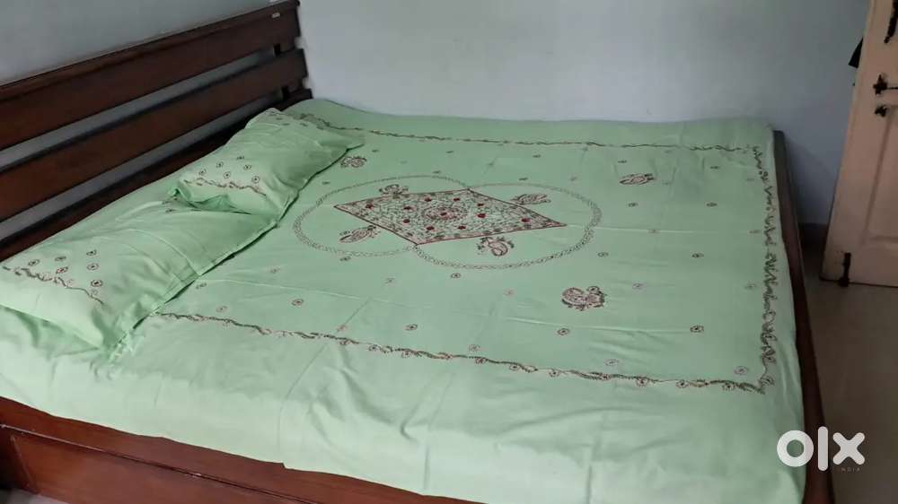 Bed, sofa and dining table