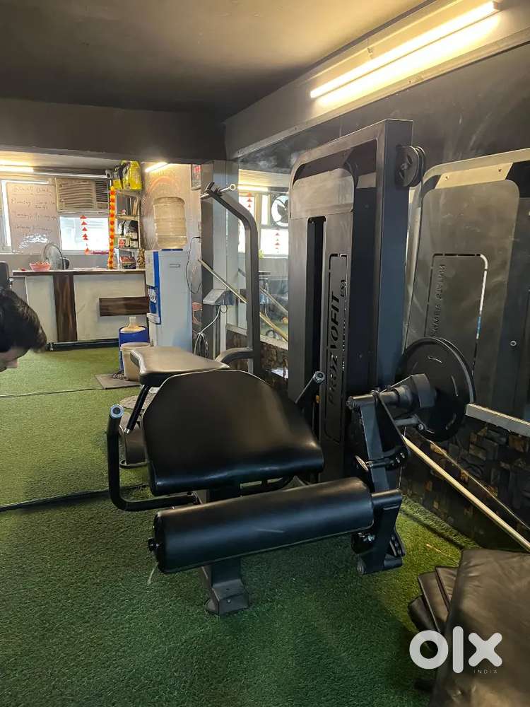 Leg extension curl machine